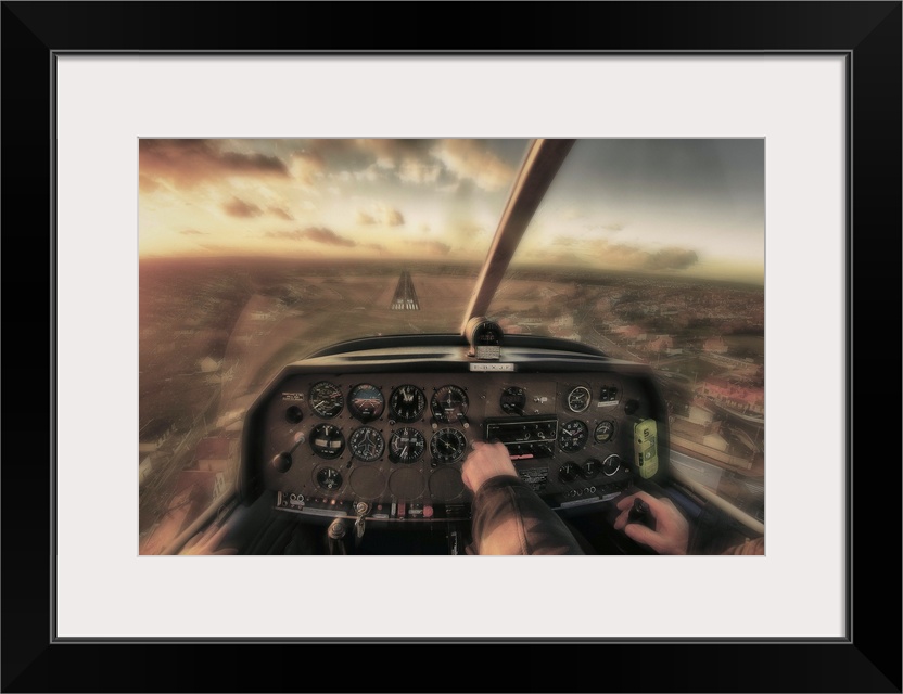 Pilot cockpit instrument panel, view of blurred landscape