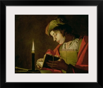 Young Man Reading by Candle Light