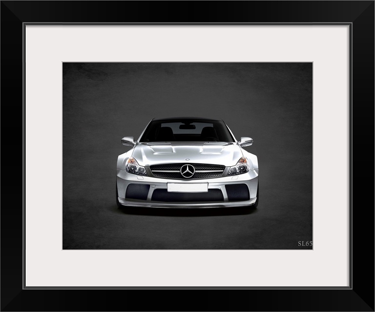 Photograph of a silver Mercedes Benz SL65 printed on a black background with a dark vignette.