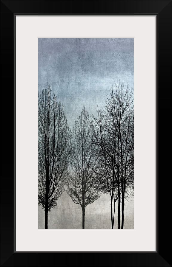 Decorative artwork featuring a black silhouette of leafless trees over a distressed background.