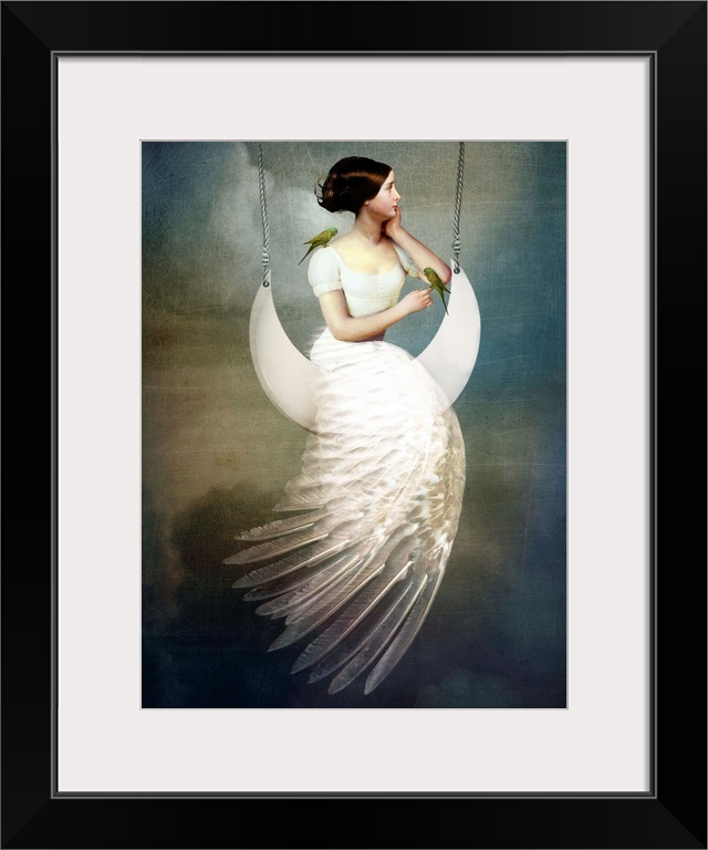 A conceptual portrait of a female with a feather dress sitting on a moon swing.