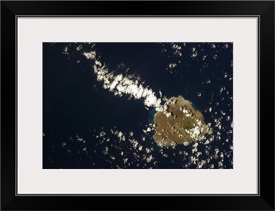 Ascension Island with a kite's tail of cloud. Darwin climbed the volcano in 1836