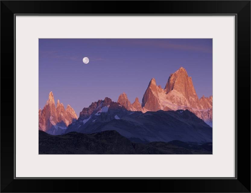 South America, Argentina, Patagonia, Parque Nacional los Glaciares. Moon over Cerro Torre and Cerro Fitz Roy at sunrise.
