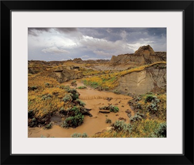 Badlands at Dinosaur Provincial Park in Alberta, Canada during thunderstorm