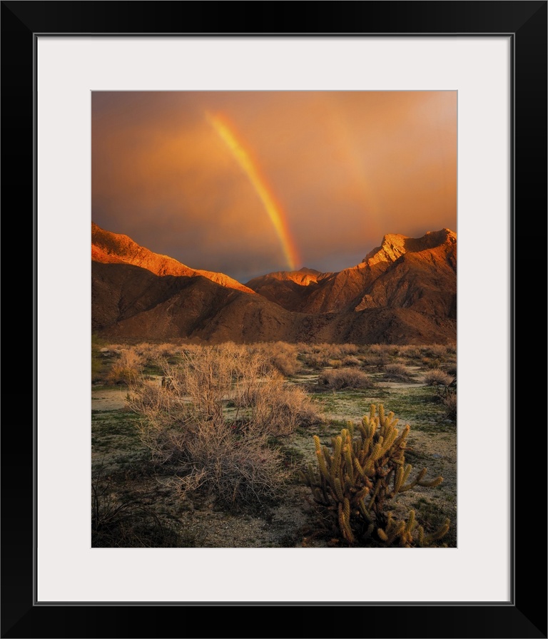 USA, California, Anza-Borrego Desert State Park. Rainbow over desert mountains at sunrise.