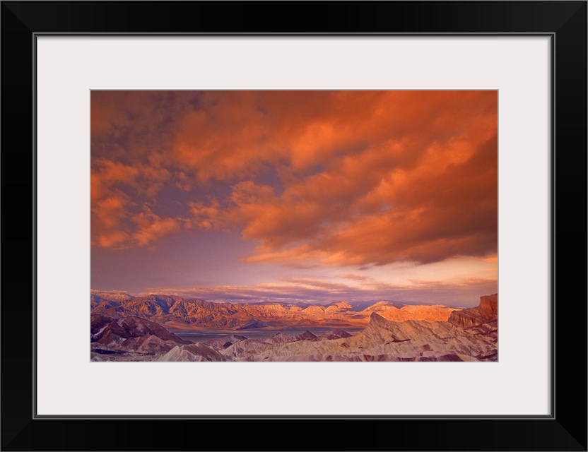 USA, California. View from Zabriske Point of Death Valley National Park. Storm clouds at sunrise.