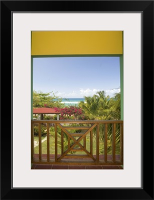 Caribbean, Puerto Rico, Vieques, beach and palm trees, viewed from porch