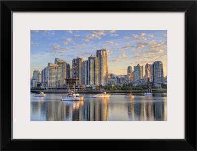 Looking across False Creek at the skyline of Vancouver, British Columbia at sunrise