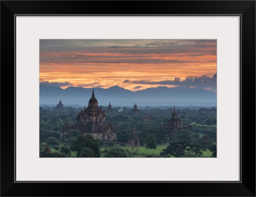 Myanmar, Bagan. Sunrise over stupas on the plains of Bagan.