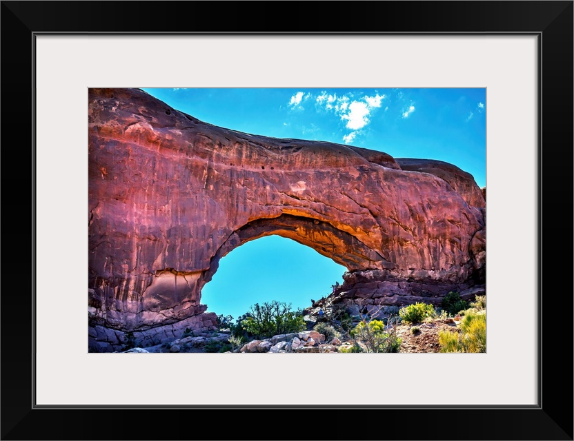 North window Arch Windows Section Arches National Park, Moab, Utah, USA. Red canyon walls and blue skies.