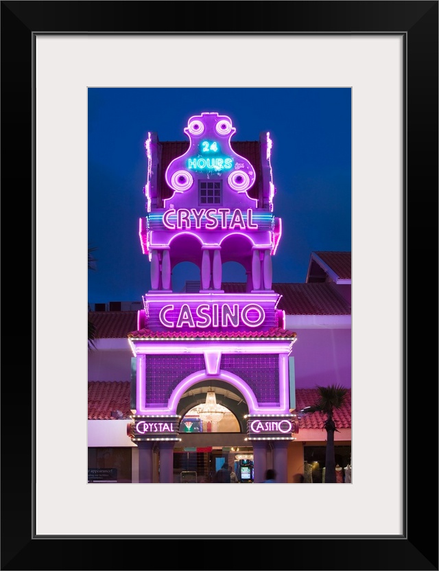 ABC Islands-ARUBA-Oranjestad:.Sign for the Crystal Casino on LG Smith Boulevard / Evening