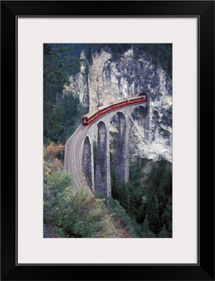 Switzerland, Passenger Train On The Tallest Rock Bridge In Switzerland