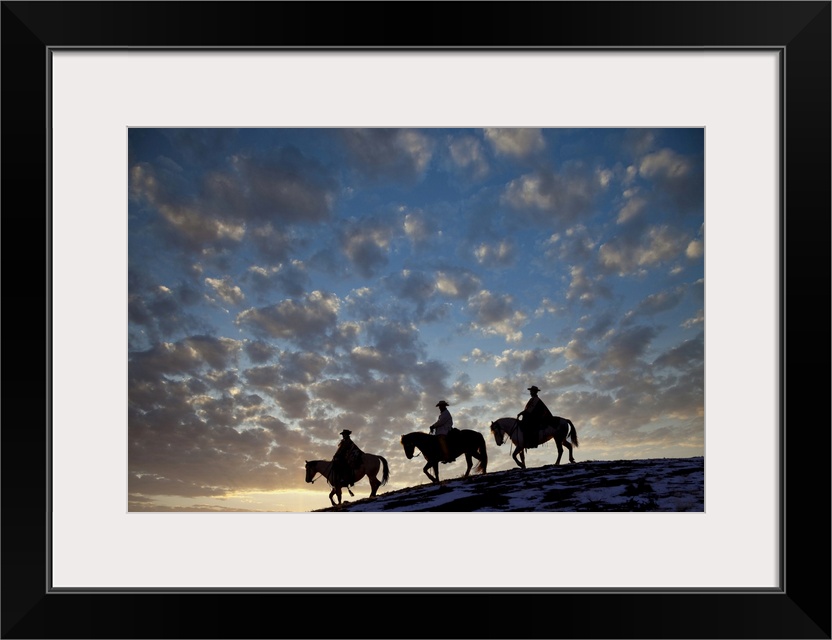 USA, Shell, Wyoming, Hideout Ranch, Cowboys And Cowgirls Silhouetted, Sunset