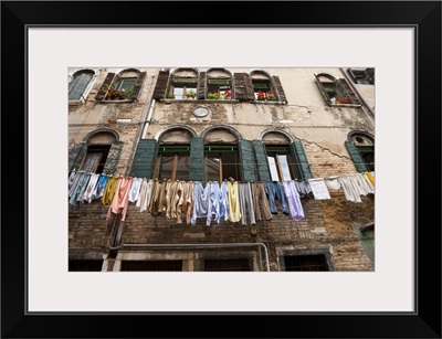 Venice, Italy, Laundry is hanging on an outside clothesline to dry in a neighborhood