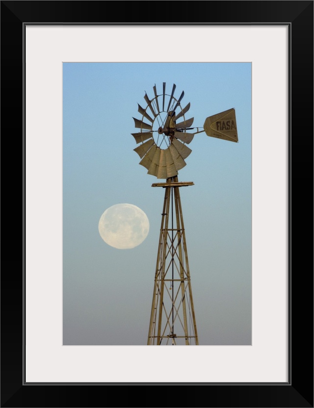 Windmill at sunrise with Full Moon, Canyon, Panhandle, Texas, USA, February 2006