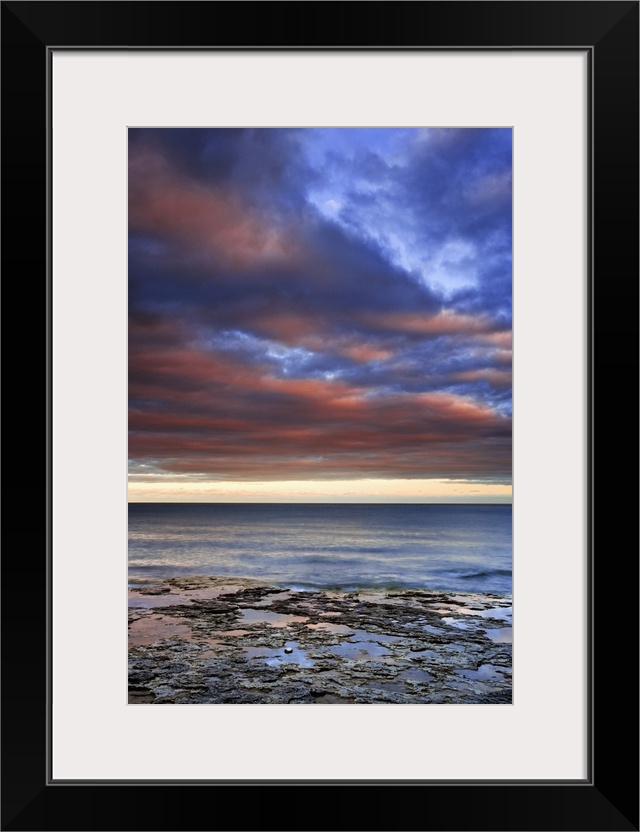 Wisconsin, sunrise on clouds seen from the shore of Lake Michigan.