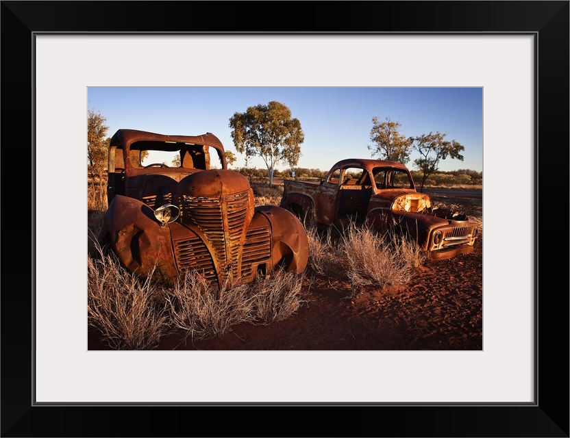 Australia, Northern Territory, Oceania, Devil's Marbles, old car wreck in the desert