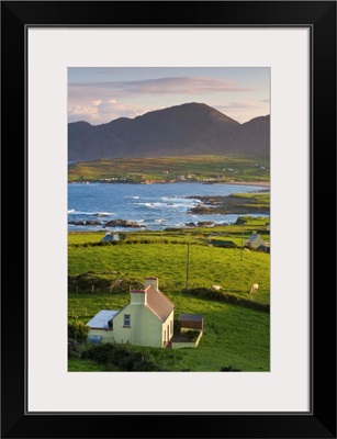 Ireland, Kerry, Sunrise over rural landscape of Ballydonegan Bay