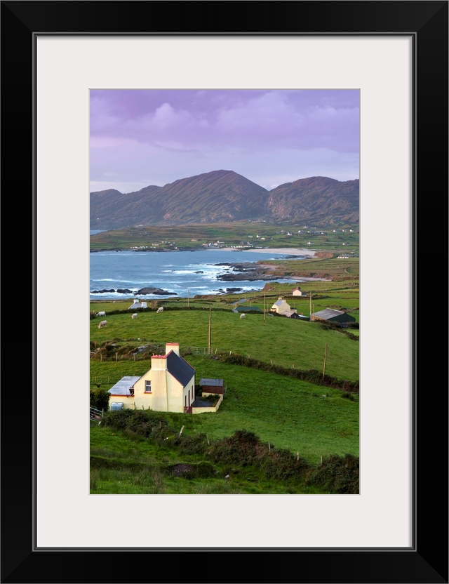 Ireland, Kerry, Sunset over the dramatic landscape of Ballydonegan Bay