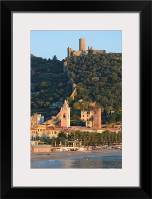 Italy, Noli, Cathedral bell-tower and Castello Ursino on top of the hill