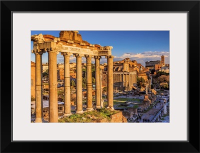 Italy, Rome, Roman Forum, Foro Romano Temple of Saturn, Coliseum in the background