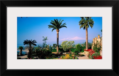 Italy, Sicily, Taormina, Garden and Mount Etna in background