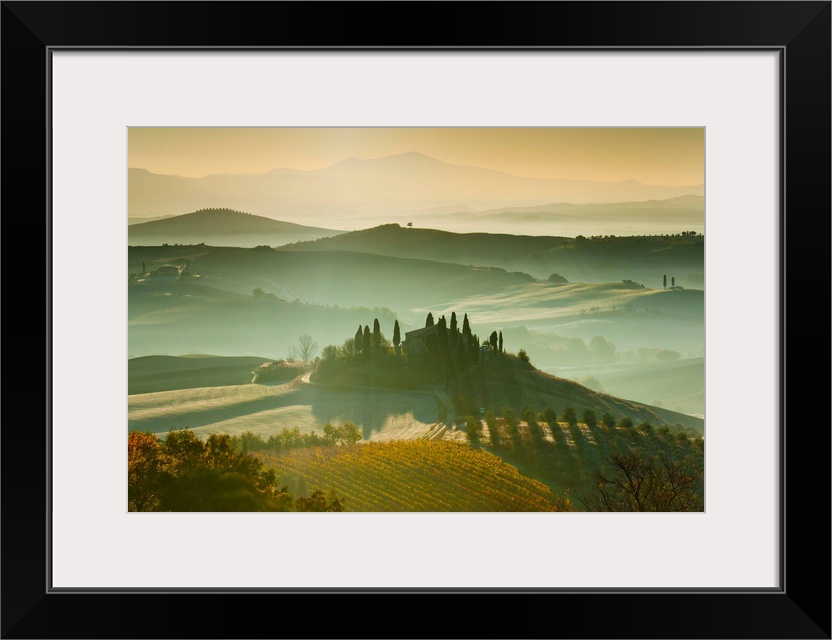 Italy, Tuscany, San Quirico d'Orcia, Rolling landscape at dawn