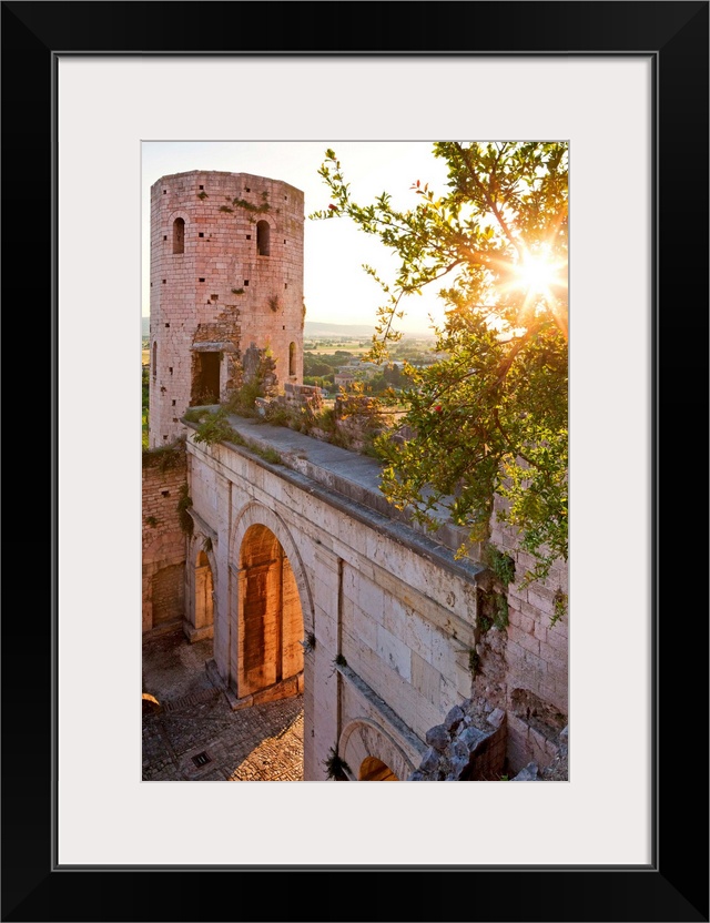 Italy, Umbria, Mediterranean area, Perugia district, Spello, Porta Venere (gate) and Torri di Properzio (towers) at sunset