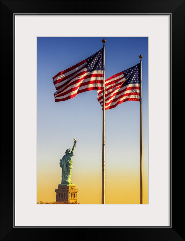 USA, New York City, Manhattan, Lower Manhattan, Liberty Island, Statue of Liberty and American Flags