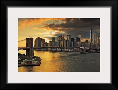 New York City, East River, Brooklyn Bridge, Downtown skyline at sunset