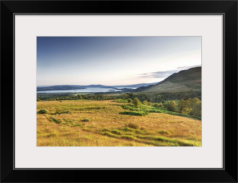 UK, Scotland, Loch Lomond, Great Britain, Field with the Conic Hill in the background at dusk.