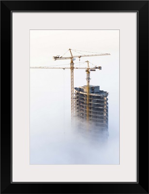 United Arab Emirates, Dubai, Construction in early morning fog