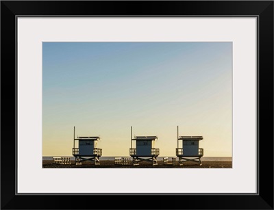 USA, California, Los Angeles, Venice Beach, Lifeguard Towers At Sunset
