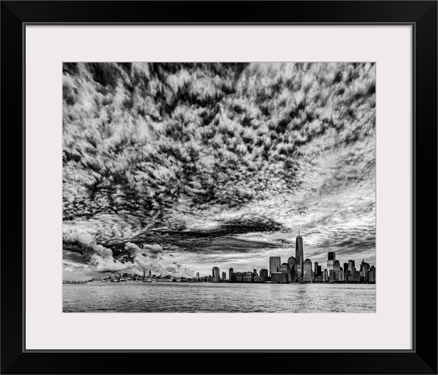 USA, New York City, Freedom Tower, Clouds over Manhattan, viewed from New Jersey at dawn.