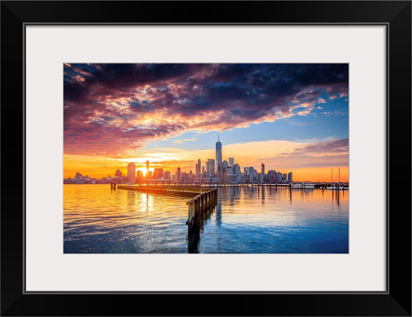 USA, New York City, Manhattan, Lower Manhattan skyline with One World Trade Center and Freedom Tower from New Jersey, at s...