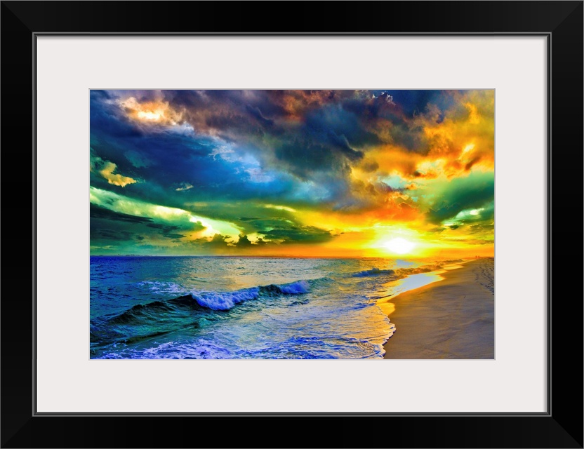 A beautiful sea at sunset in this landscape photo. A seascape with waves on the shore before a beautiful sunset with expan...