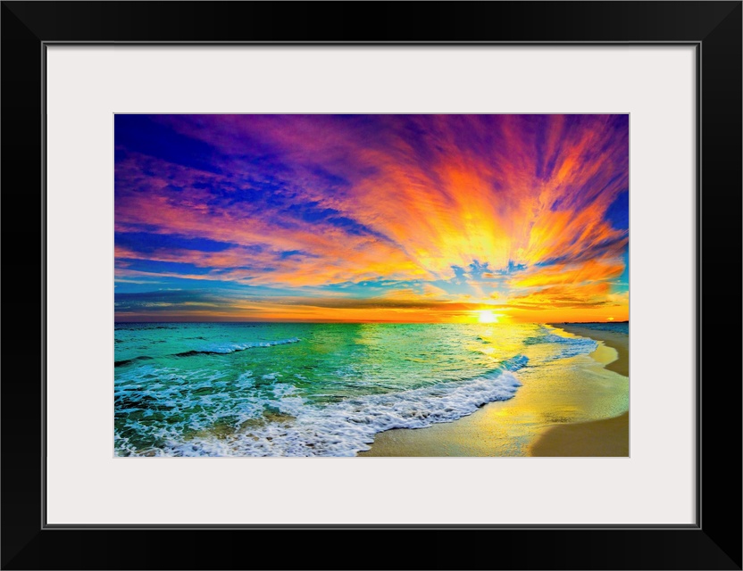 A landscape of a colorful ocean sunset in this green sea photo. An art print featuring waves on the shore with a orange an...