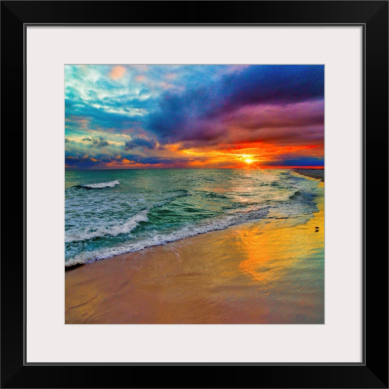 A square image of the sun descending over the ocean amid bright, technicolor clouds.