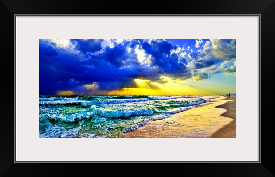 Blue and green waves beneath a golden sunrays sunset. Landscape taken on Navarre Beach, Florida.