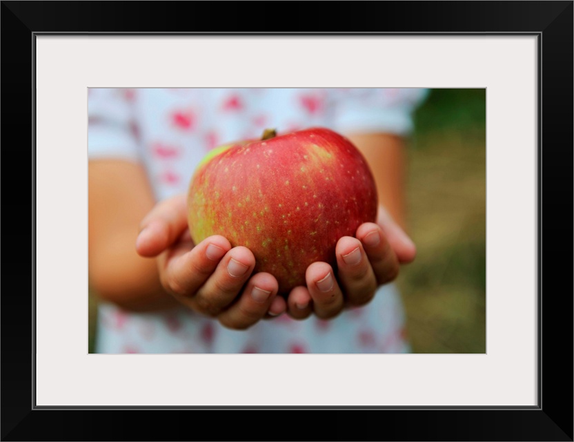 Girl Holding Red Apple