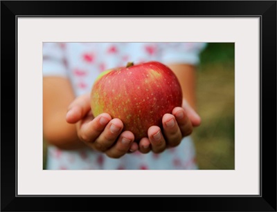 Girl Holding Red Apple