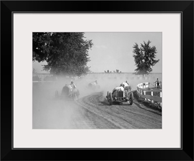 Racecars rounding a turn at the Rockville Fair auto races, August 25, 1923