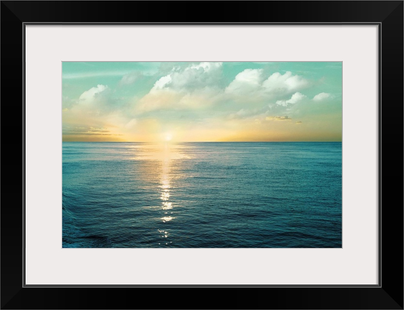 A photo of a solace sunrise glimmering on the ocean as it ascends to the sky.