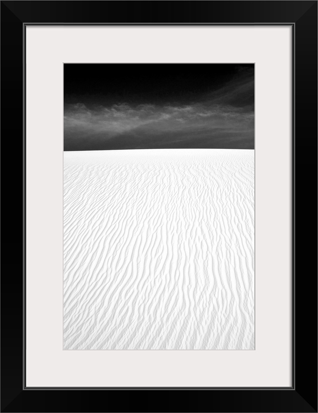 White sand dunes with several ripples.