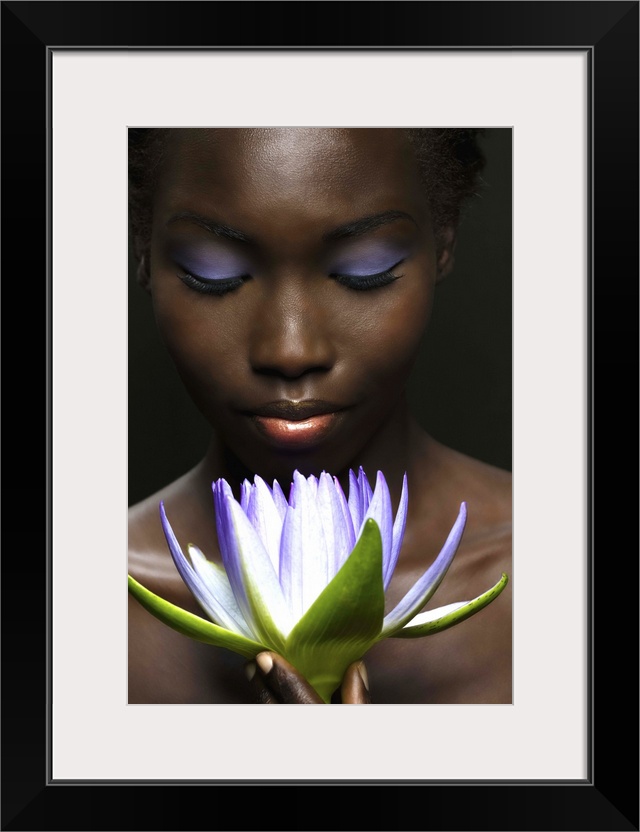 Afro-American woman with purple lotus flower