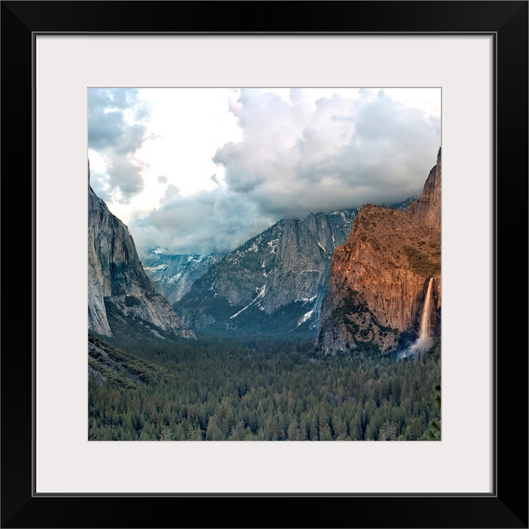This was taken in Yosemite at tunnel view scenic pullout. Clouds were epic; obscuring half dome with view of Bridalveil Fa...