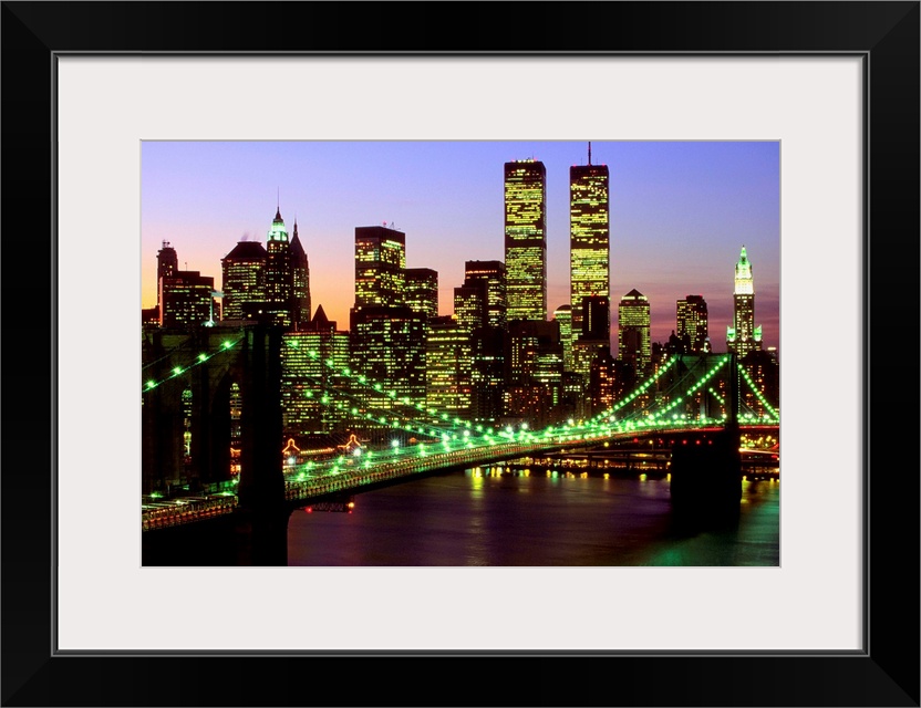 Brooklyn Bridge and Manhattan skyline at dusk, New York
