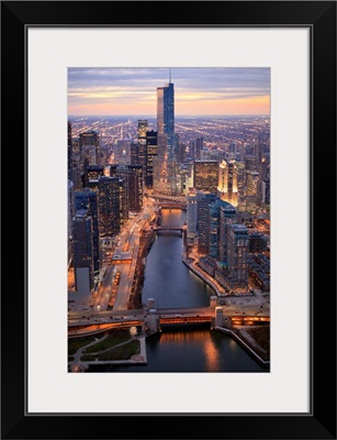 Chicago River and Trump Tower from above during sunset with clear crisp skies.