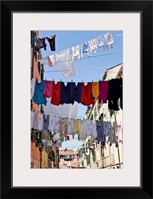 Clotheslines hanging from apartments in Venice, Italy