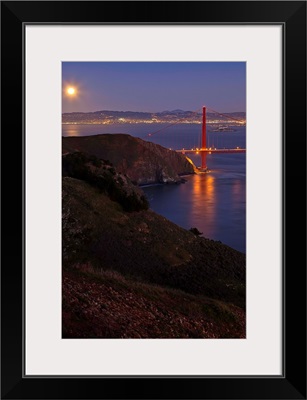 Full moon over Golden Gate Bridge.